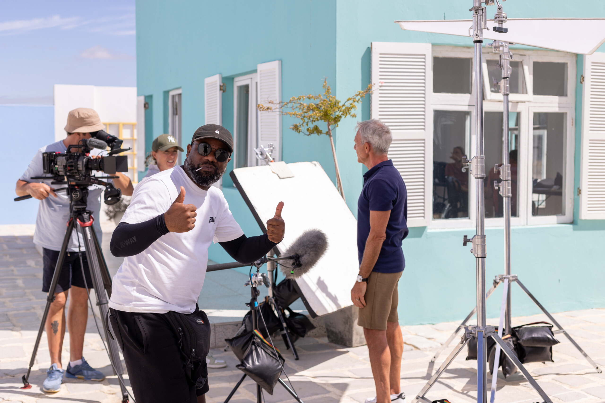 Sound operator giving thumbs up to camera